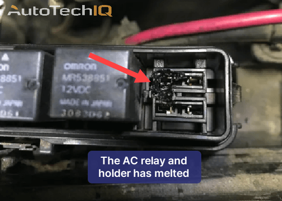 The AC relays have melted along with the fuse box, causing AC compressor failure