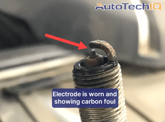Spark plug issue caused by a worn and carboun-fouled electrode