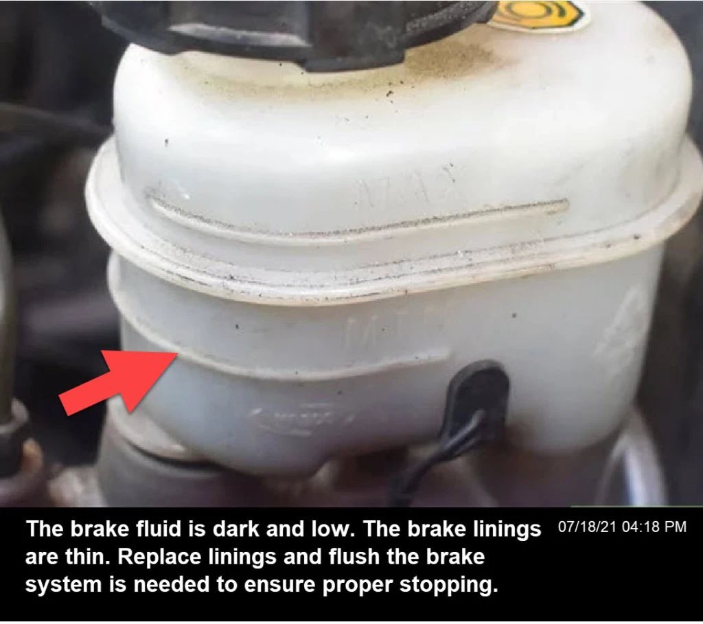 The brake fluid reservoir showa low brake fluid level, which can cause brake issues resulting in vibrations, noises, and warning lights