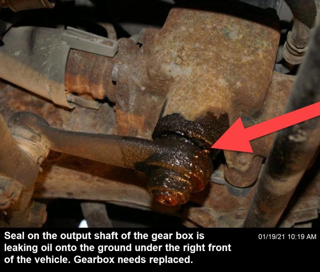 A faulty seal on the output shaft gear box allows oil to leak from the vehicle