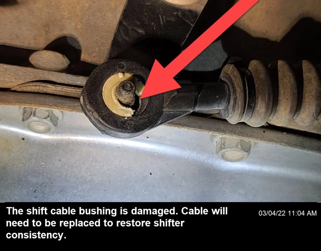 A transmission shift cable showing damage signs, making the transmission stuck