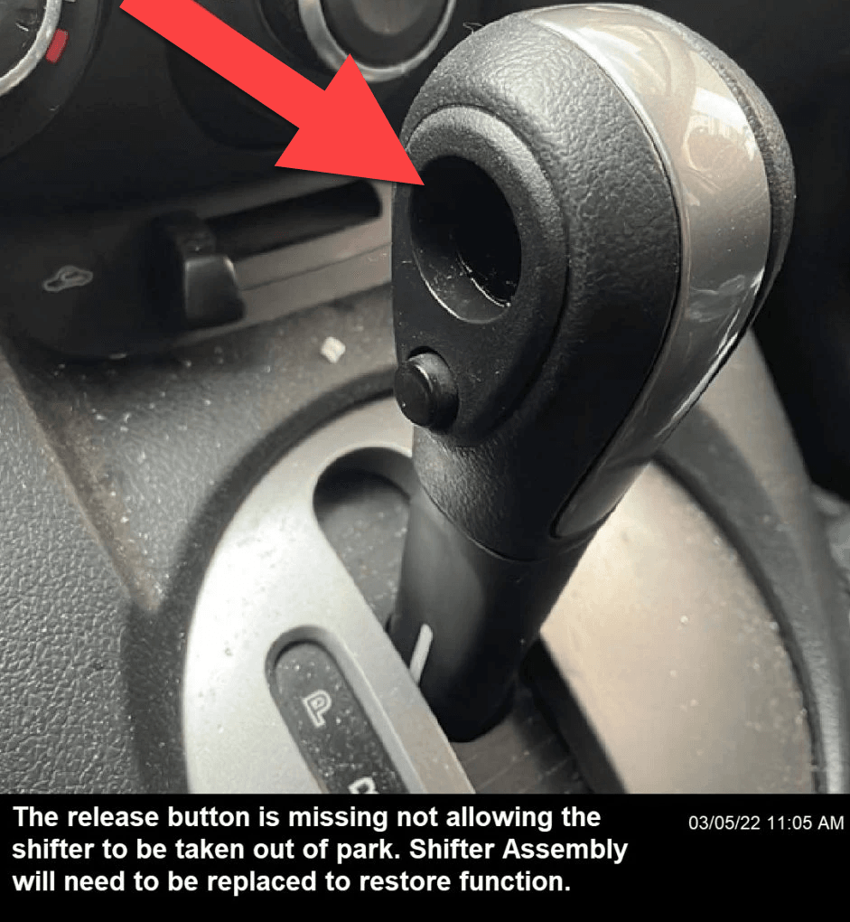 A shifter with the release button missing, making the car stuck on park