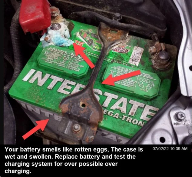 Worn and old battery leaking chemicals that produce a rotten egg smell