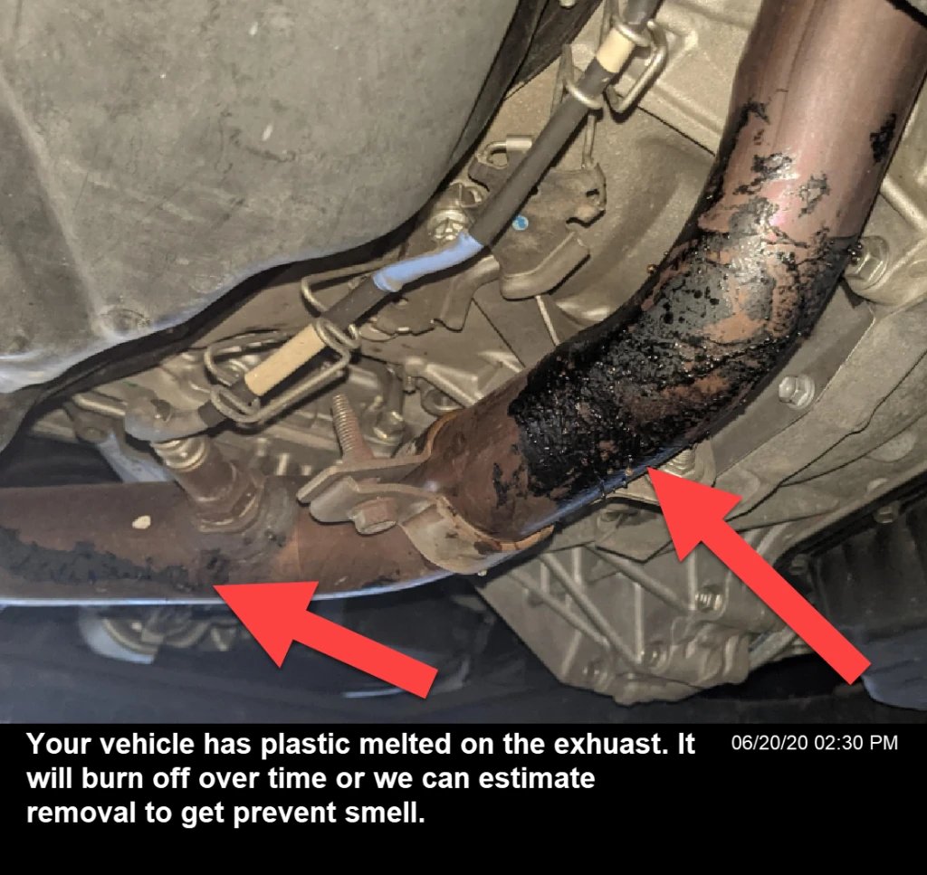Plastic burning on the exhaust causing the burning plastic smell from the vehicle